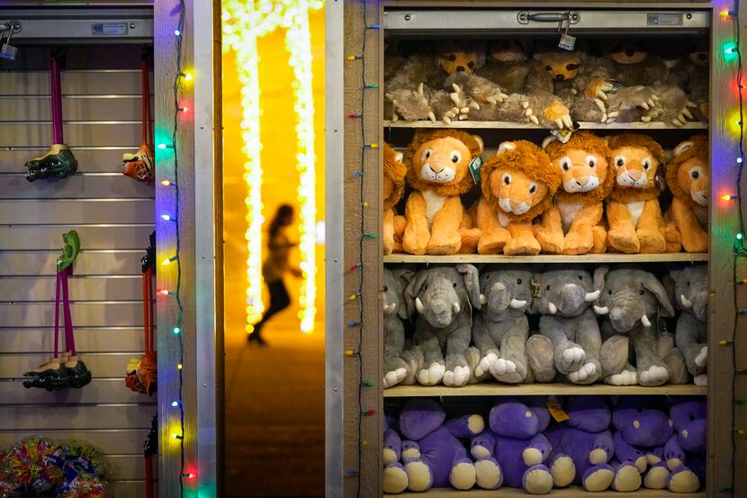 Plush toys are seen in the Holiday Village during Dallas Zoo Lights on Wednesday, Nov. 18,...