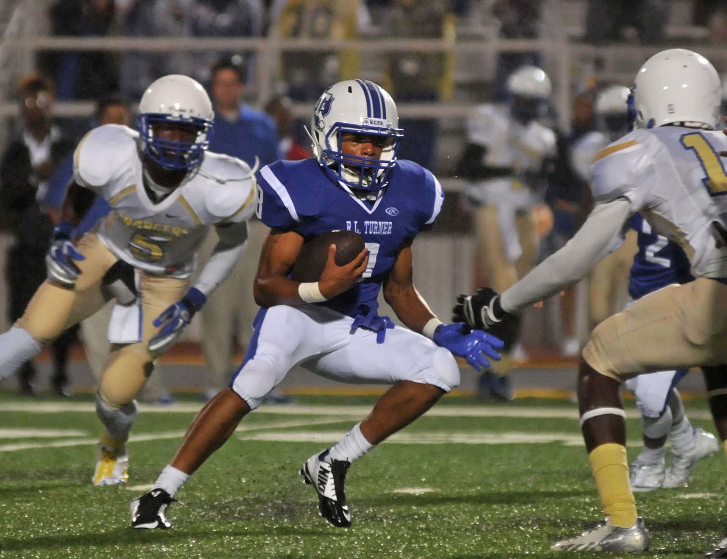 R.L. Turner junior Jesus Barrios (8) looks for an opening as Conrad sophomore Junior Dorbah...