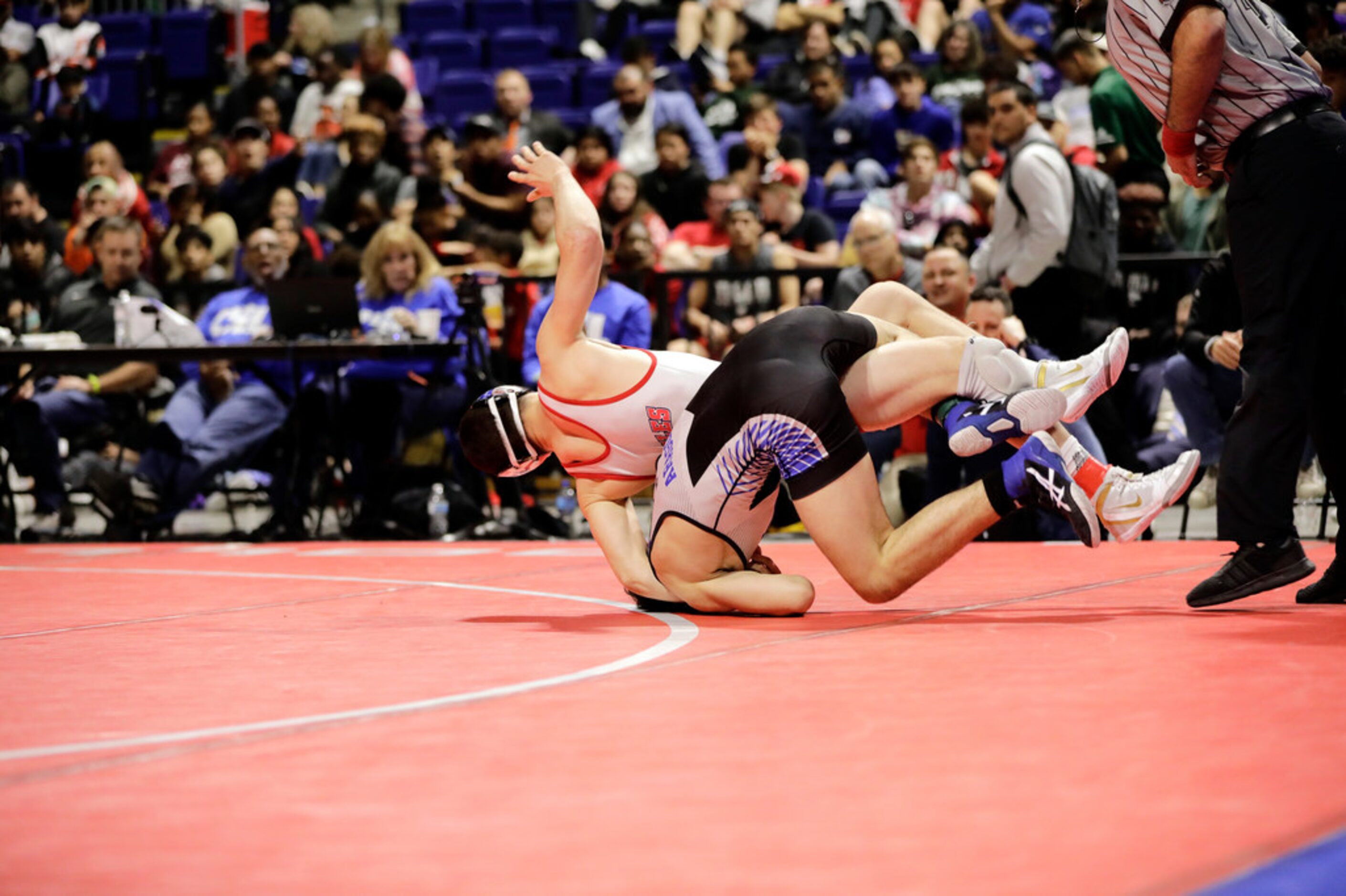 Mario Danzi of Allen wrestles during the UIL Texas State Wrestling Championships, Saturday,...