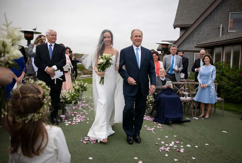 Barbara Bush is walked up the aisle by her father, Pres. George W. Bush, during her wedding...