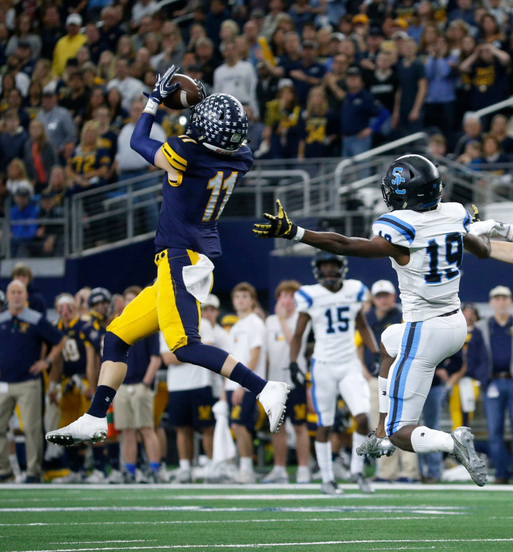 Highland Park's Whit Winfield (11) intercepts a ball intended for Shadow Creek's Carlton...