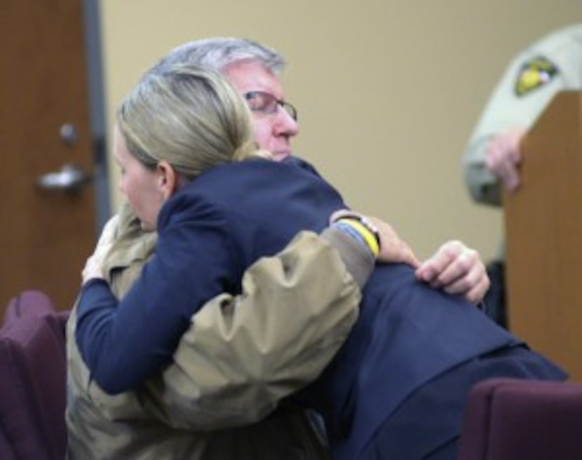  Bernie Tiede hugs attorney Jodi Cole after both sides in his trial rested Friday in...