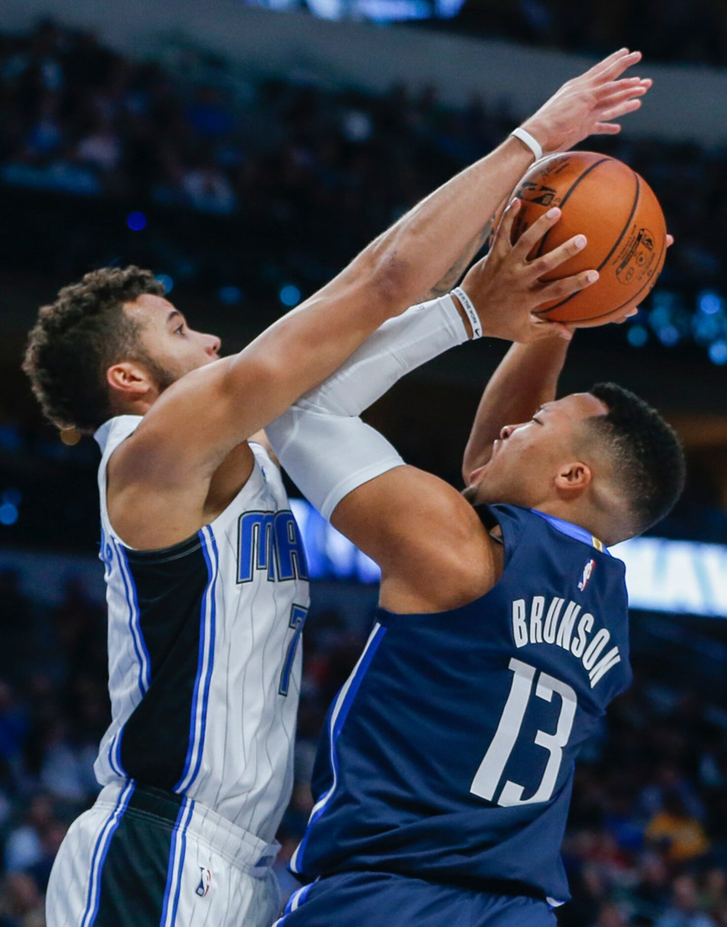 Dallas Mavericks guard Jalen Brunson (13) attempts a shot past Orlando Magic guard Michael...