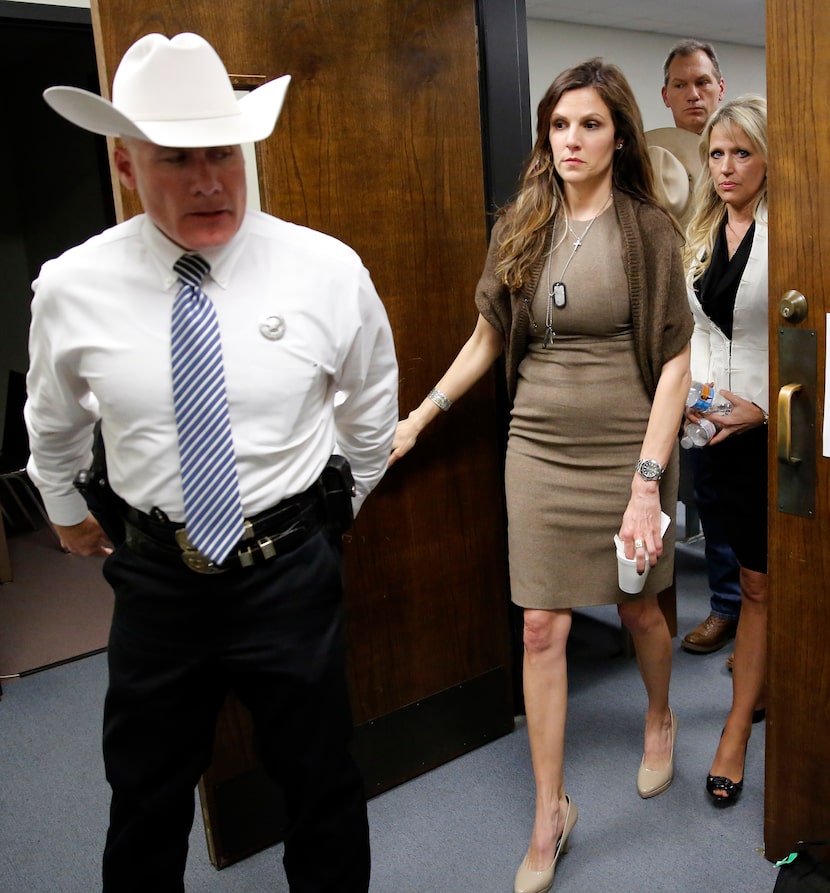 Taya Kyle, wife of slain Navy SEAL Chris Kyle, leaves the Erath County Donald R. Jones...