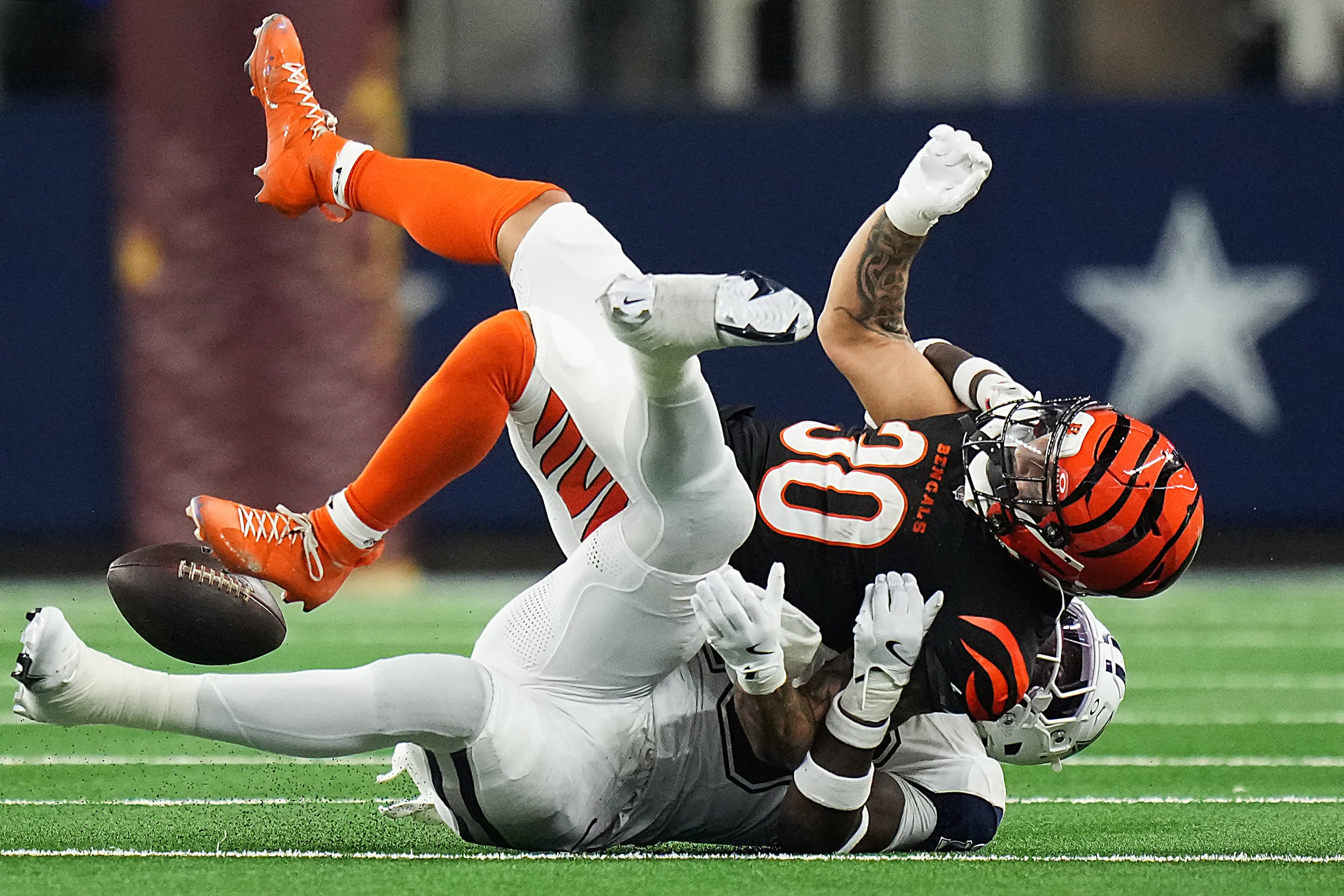 Dallas Cowboys linebacker DeMarvion Overshown (13) breaks up a pass intended for Cincinnati...