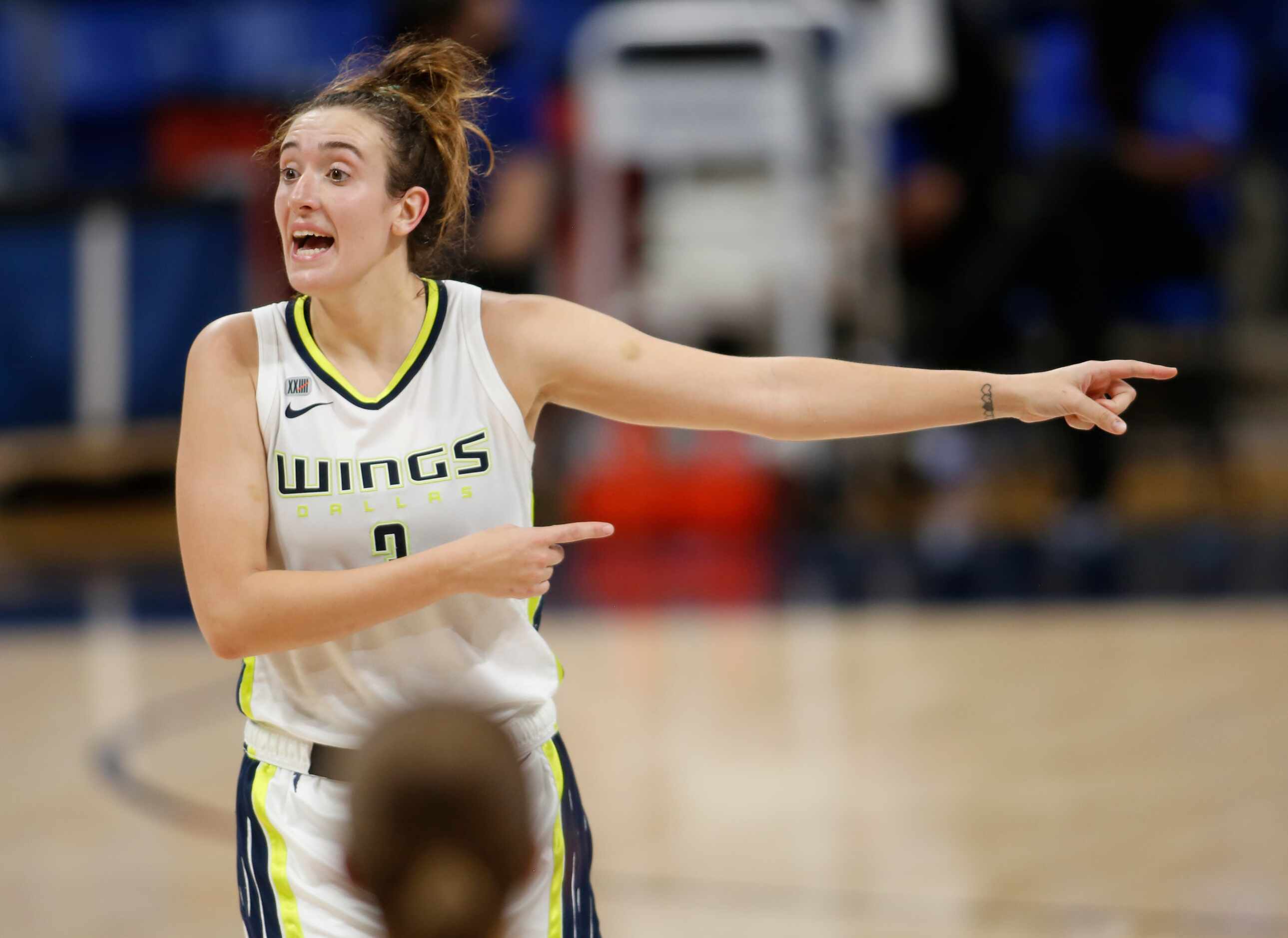 Dallas Wings guard Marina Mabry (3) directs teammates during first half action against...