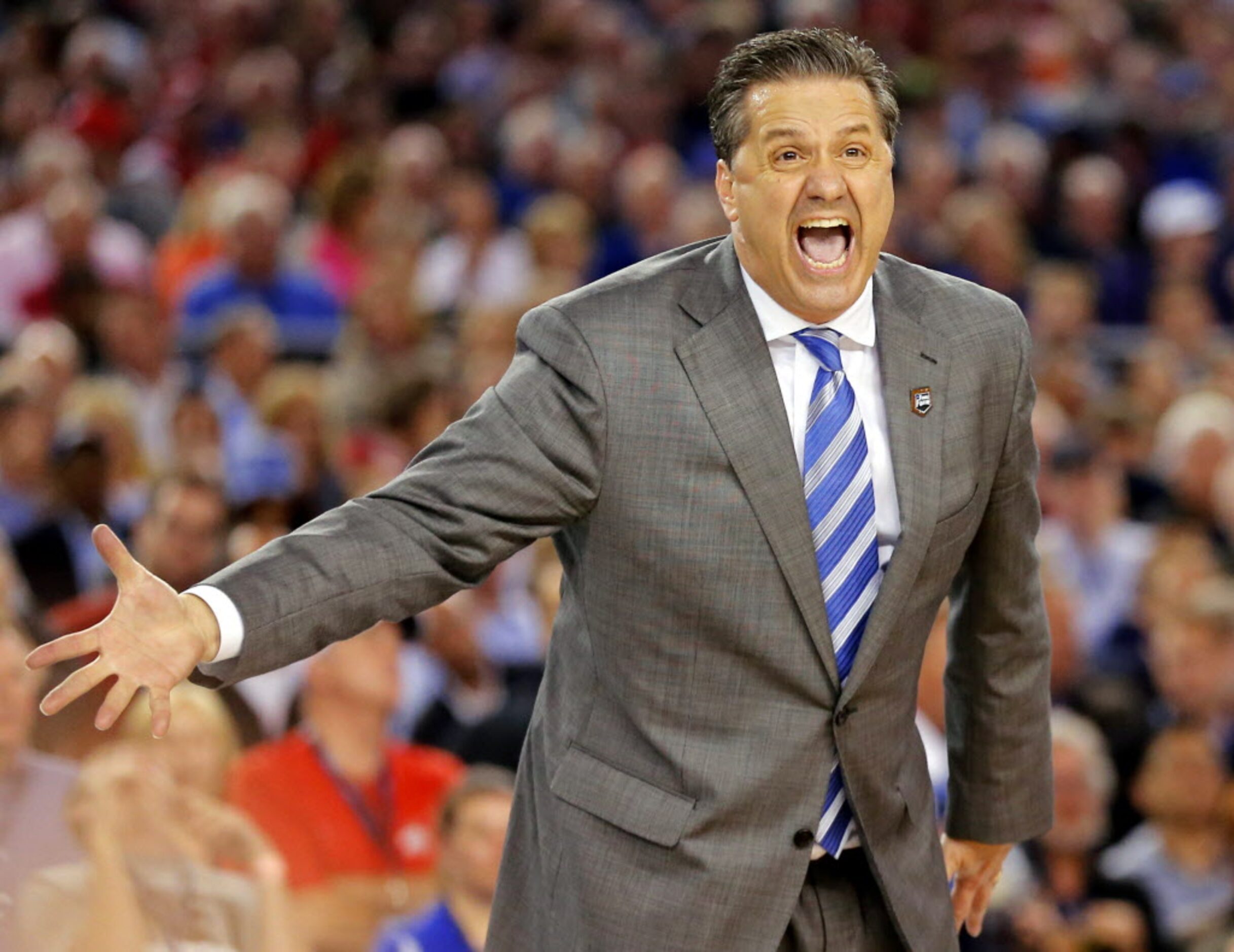 Kentucky Wildcats head coach John Calipari yells during the second half of their NCAA Final...