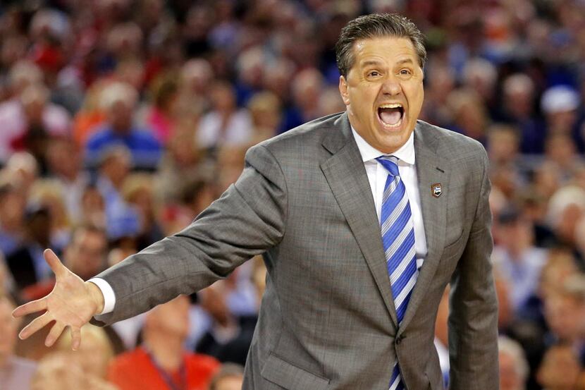 Kentucky Wildcats head coach John Calipari yells during the second half of their NCAA Final...