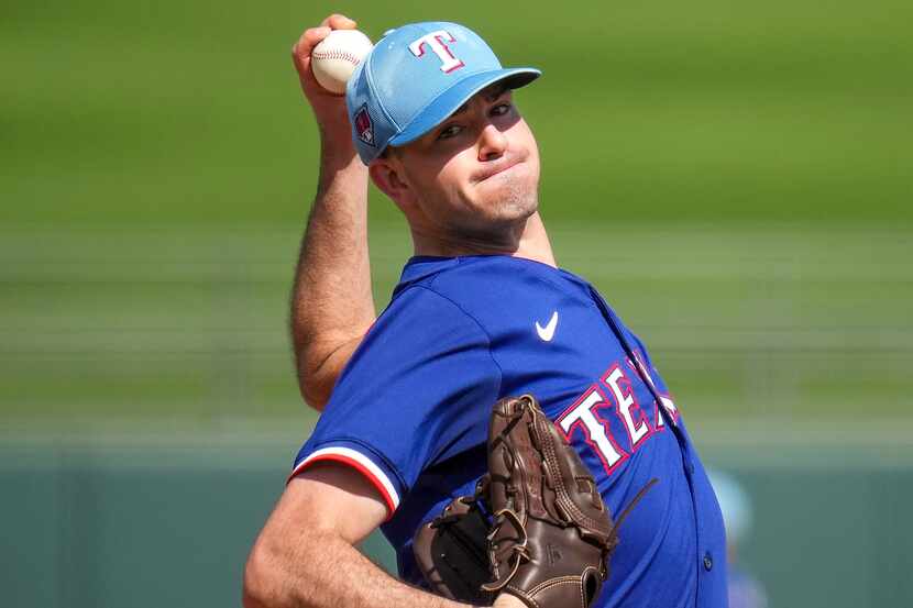 Texas Rangers pitcher Cody Bradford delivers during the third inning against the Kansas City...