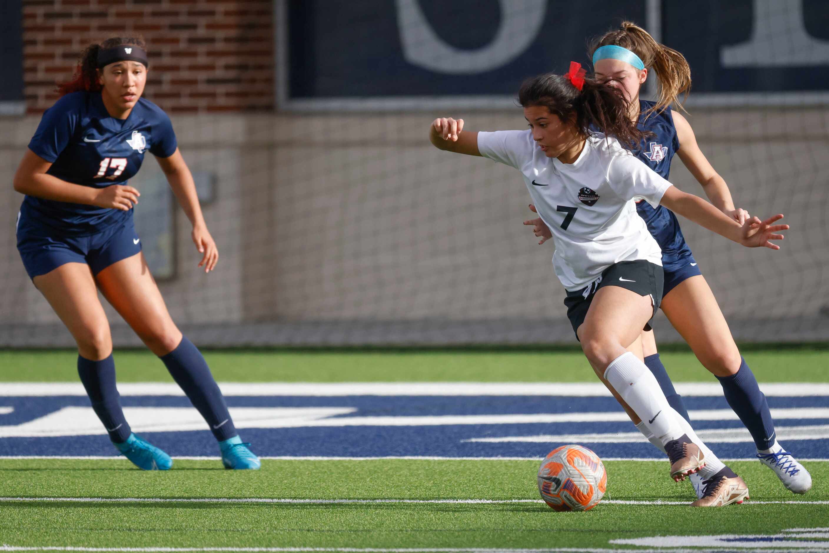 Marcus’ Bella Campos dribbles the ball against Allen high during the first half of a...