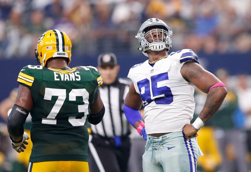 Dallas Cowboys defensive tackle David Irving (95) celebrates in front of Green Bay Packers...