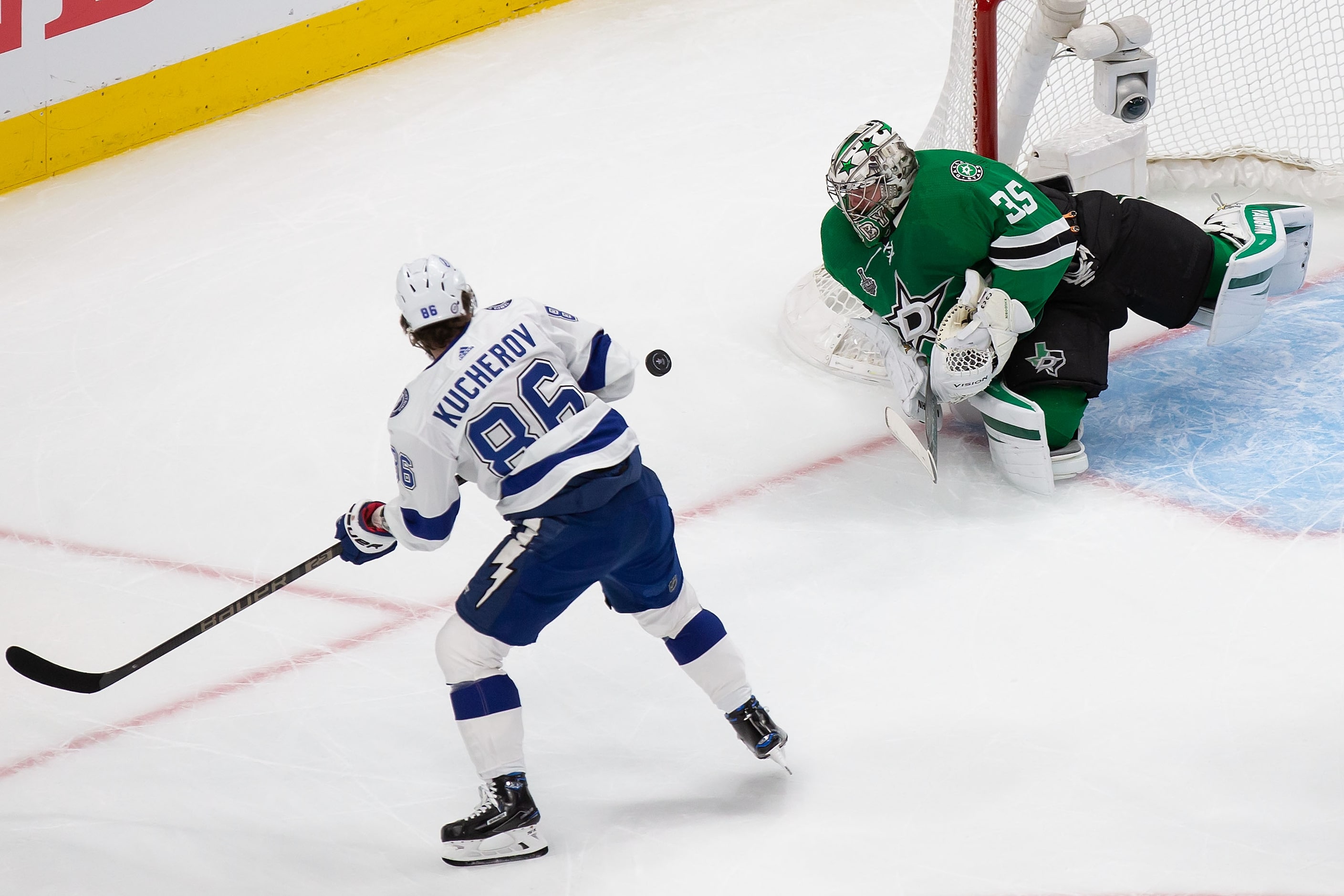 Goaltender Anton Khudobin (35 of the Dallas Stars makes a save against Nikita Kucherov (86)...