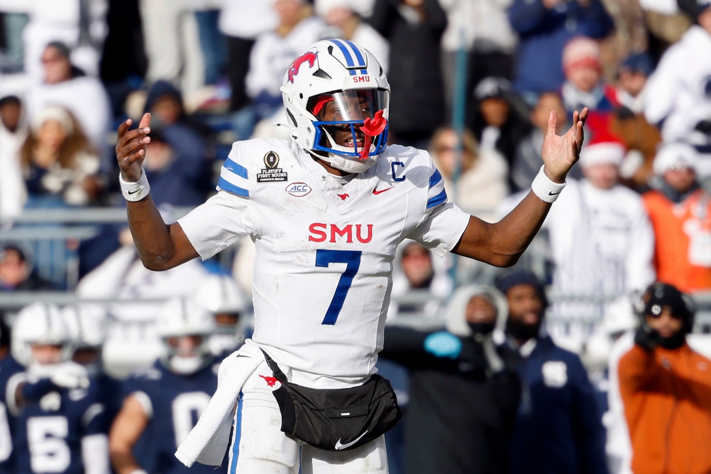 SMU quarterback Kevin Jennings (7) reacts after a delay of game penalty during the second...