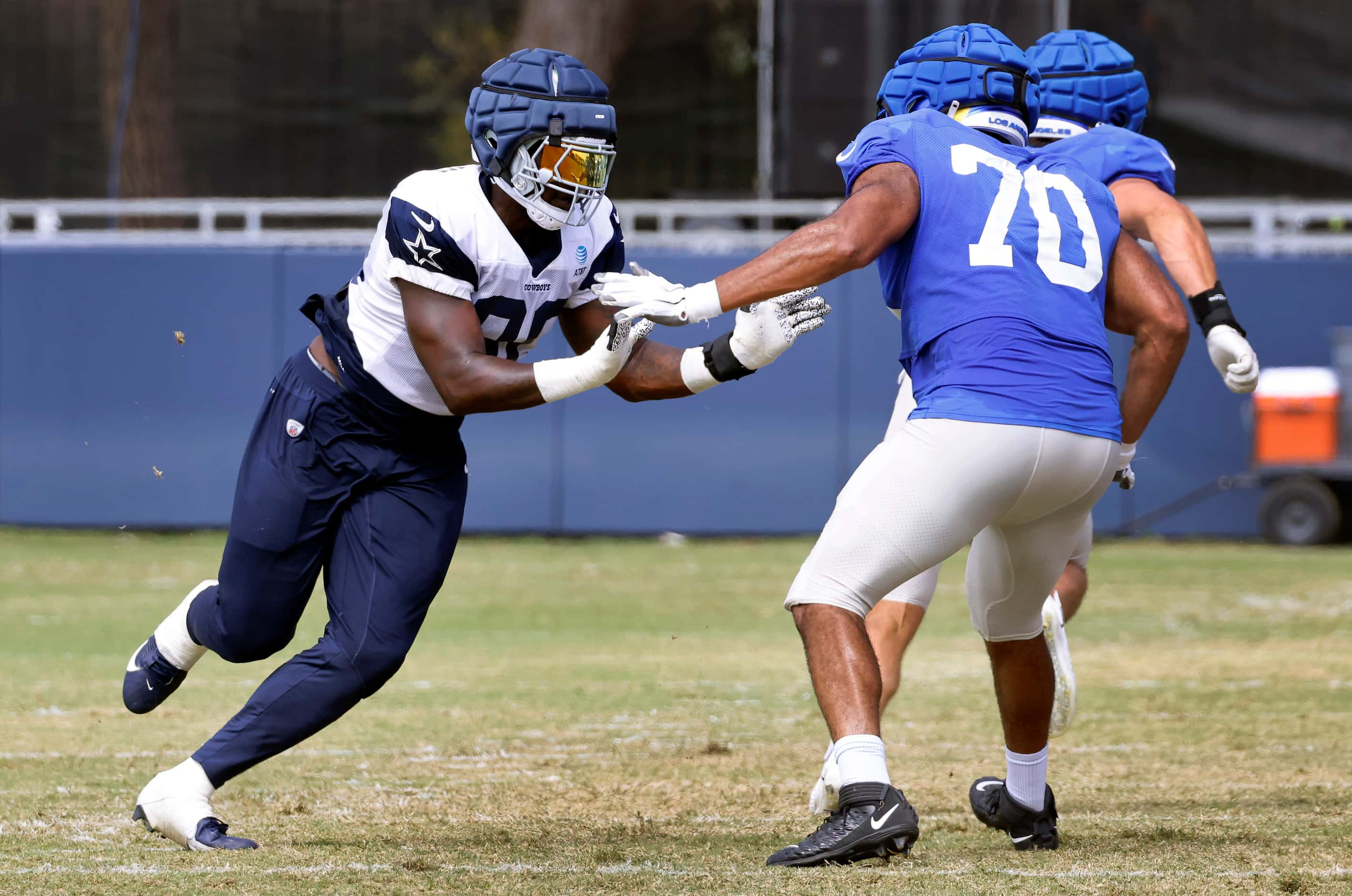 Dallas Cowboys defensive end DeMarcus Lawrence (90) faces off against Los Angeles Rams...