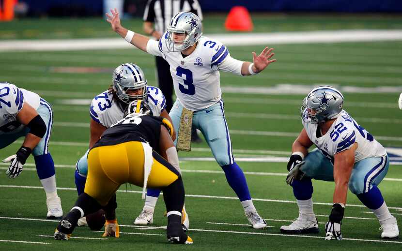 Dallas Cowboys quarterback Garrett Gilbert (3) changes a play at the line of scrimmage...