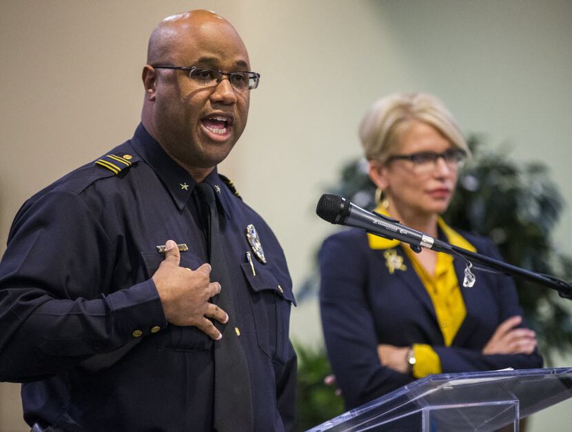 Dallas Police Department Deputy Chief Malik Aziz addressed a question from the audience as...