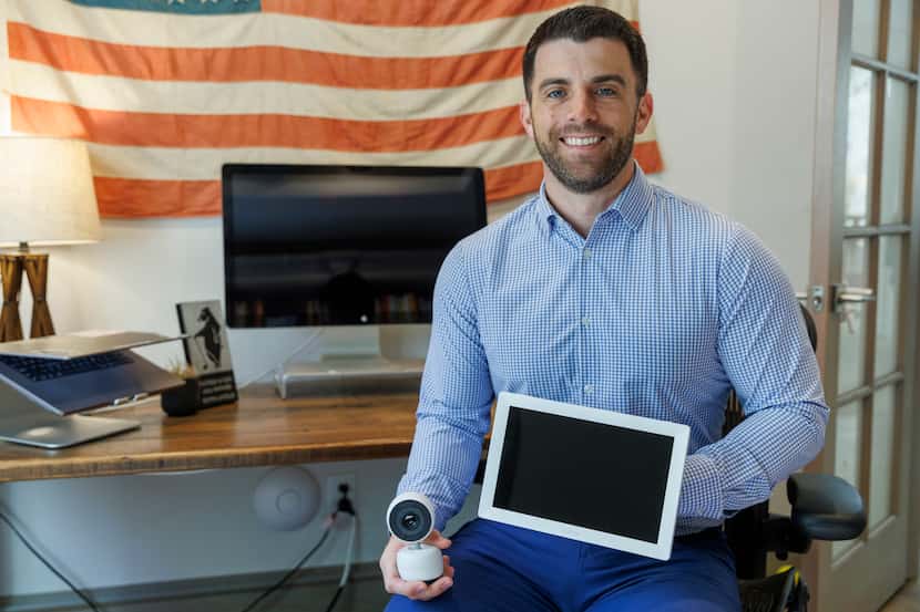 Harbor CEO and co-founder Kevin Lavelle sits in his home office with Harbor’s baby monitor...