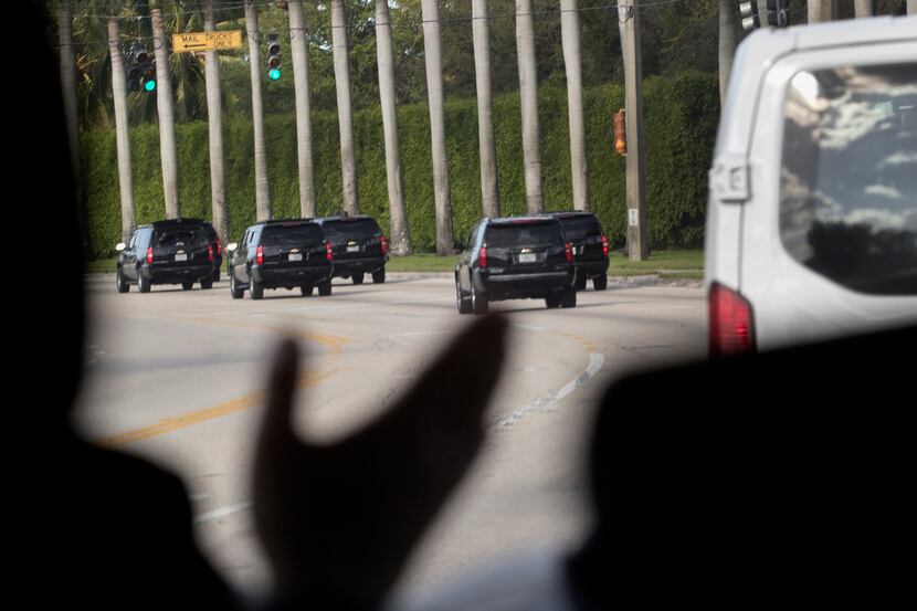 President Donald Trump's motorcade on its way to Trump International Golf Club, where White...