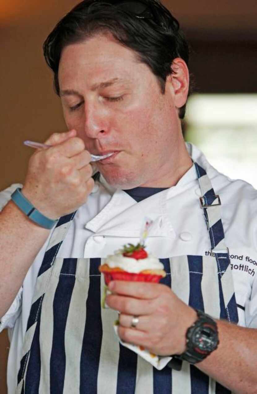 
Chef Scott Gottlich of Bijoux samples a Very Berry Yogurt Cupcake prepared by Grace Twomey...