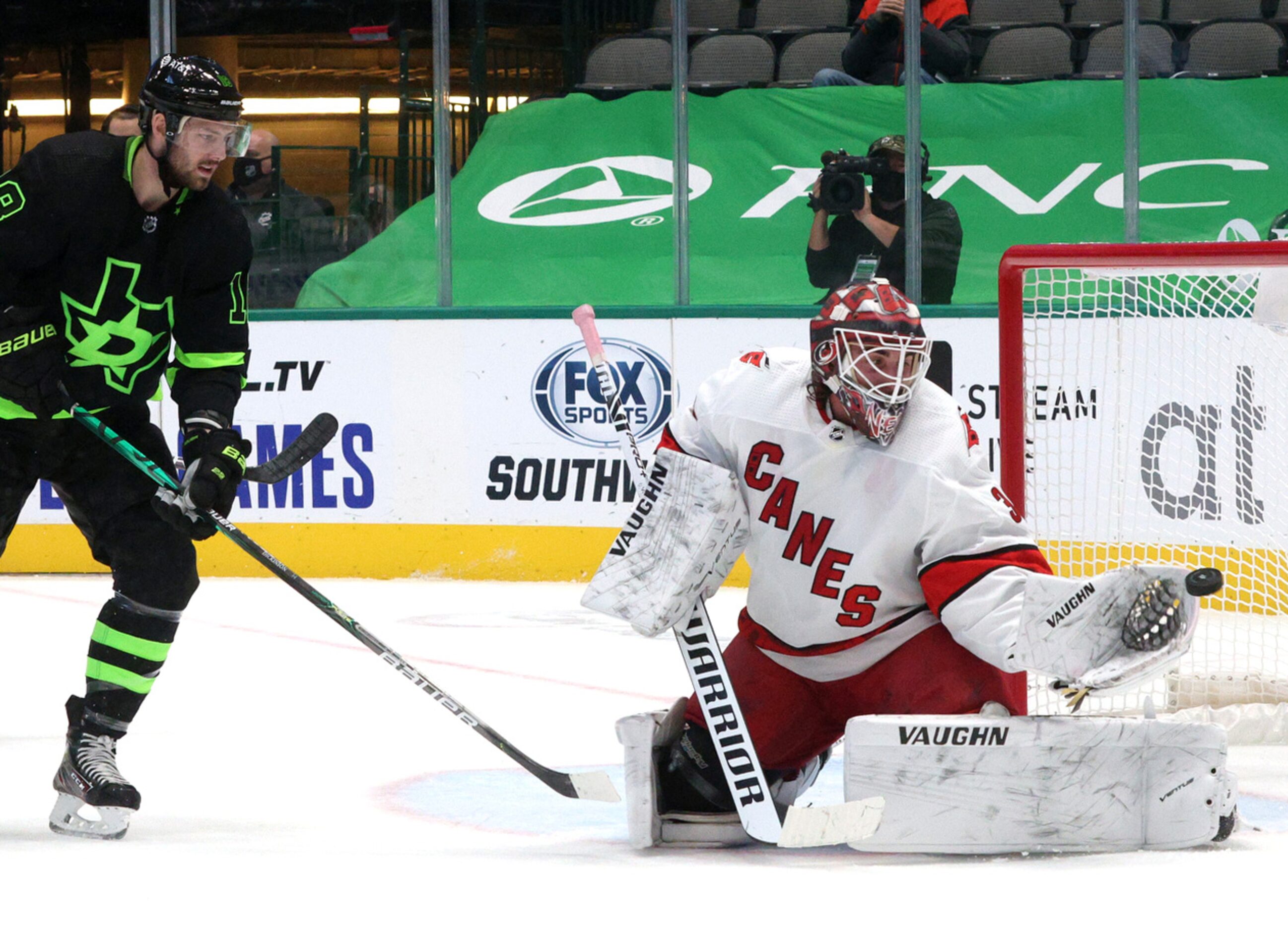 Dallas Stars center Jason Dickinson (18) fails to score past Carolina Hurricanes goaltender...