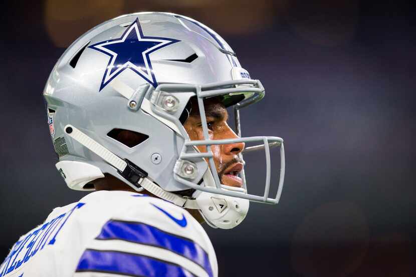 FILE — Dallas Cowboys quarterback Dak Prescott (4) looks up during warmups before an NFL...