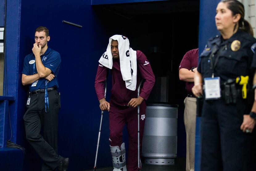 Texas A&M Aggies wide receiver Jhamon Ausbon (2) stands on crutches in the tunnel during the...