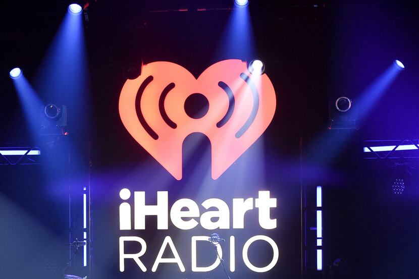FILE- In this Nov. 7, 2017, file photo, the logo for iHeartRadio, owned by iHeartMedia,...