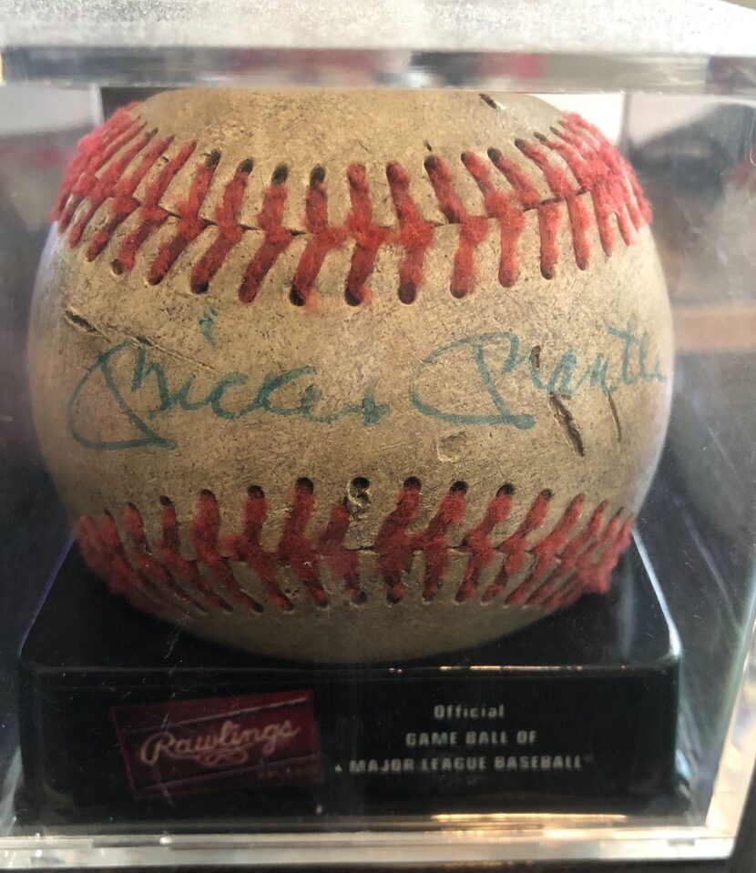 My beaten-up, Mickey Mantle-signed little league baseball.