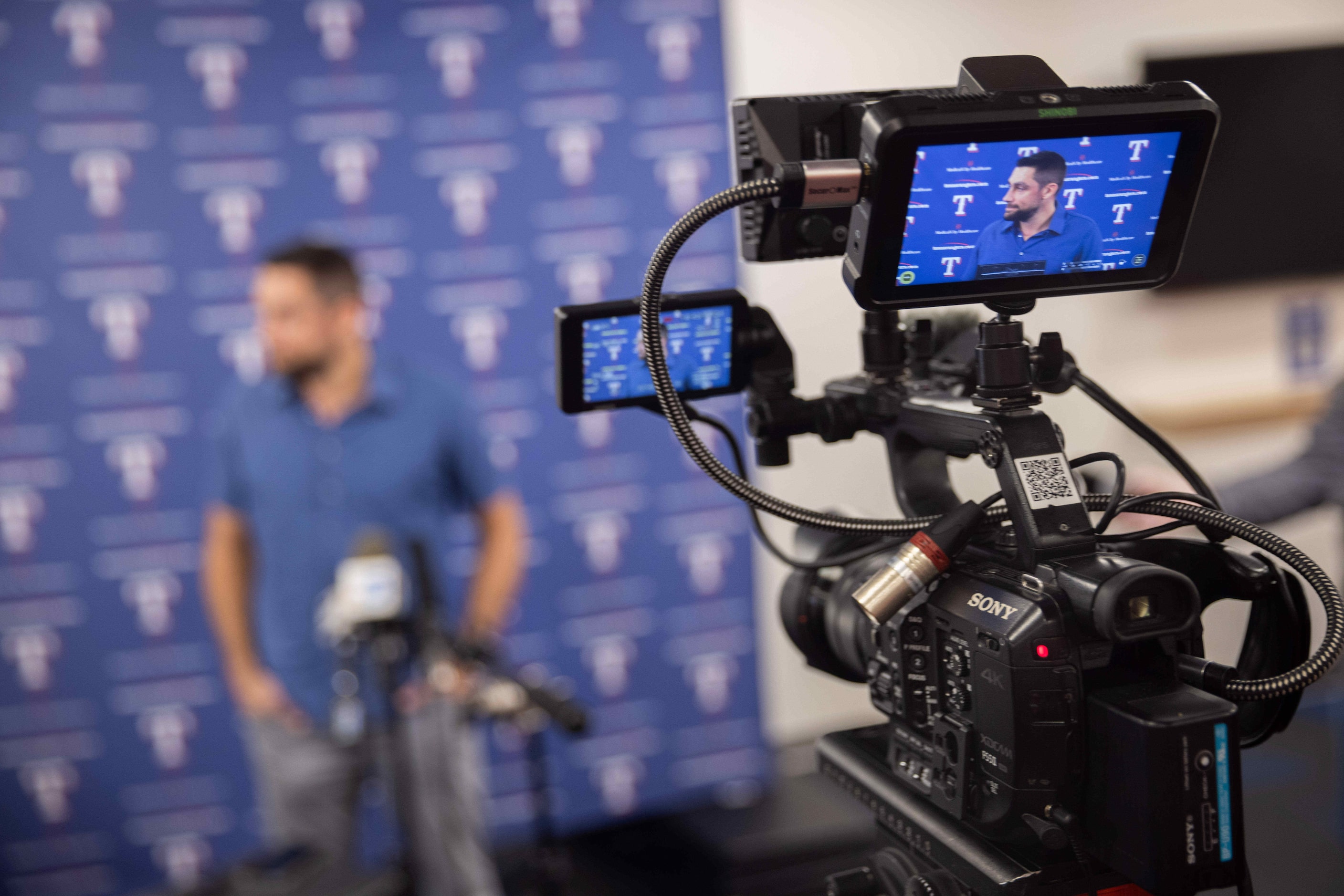 Texas Rangers starting pitcher Nathan Eovaldi speaks during a press conference announcing...