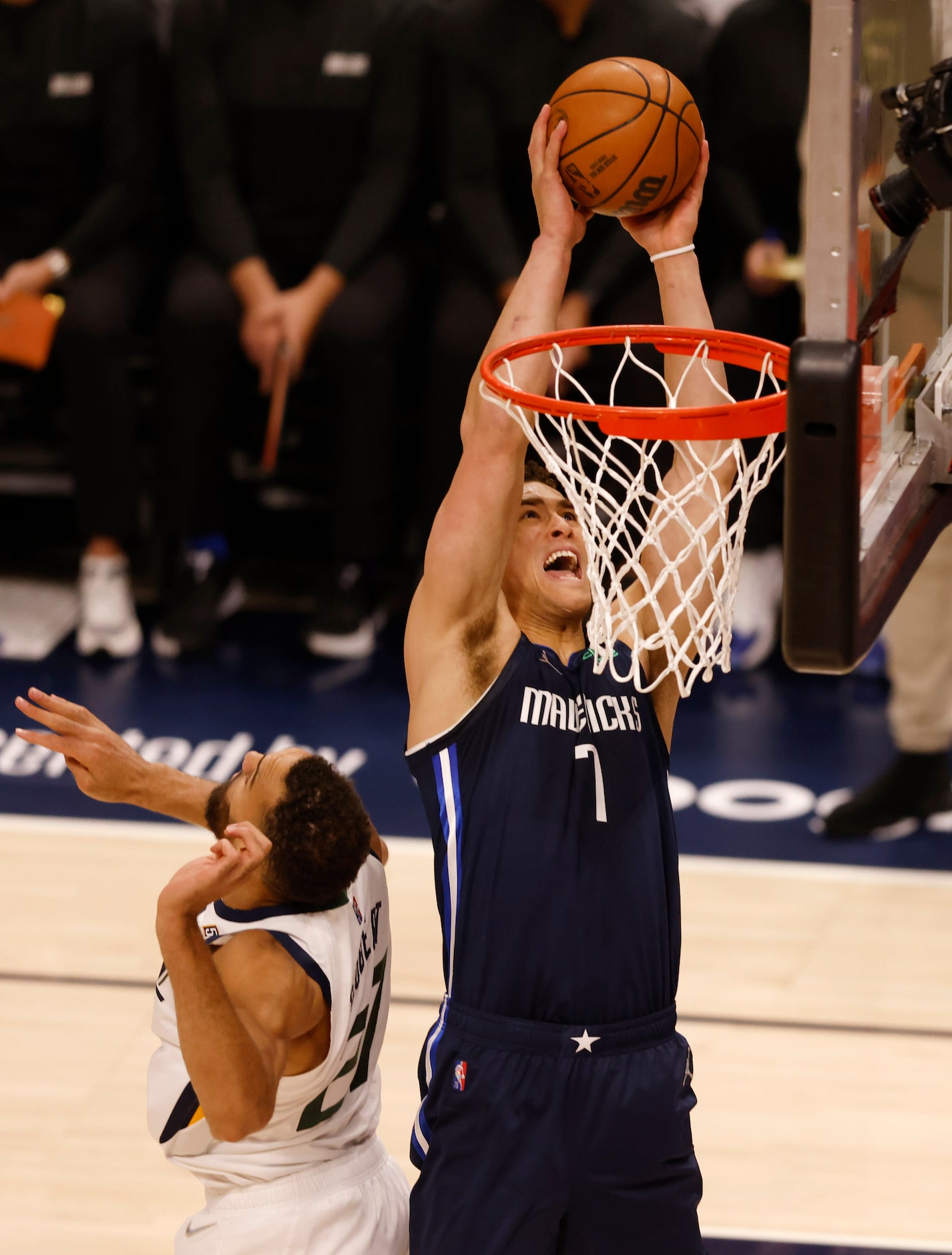 Dallas Mavericks center Dwight Powell (7) attempts a shot in front of Utah Jazz center Rudy...