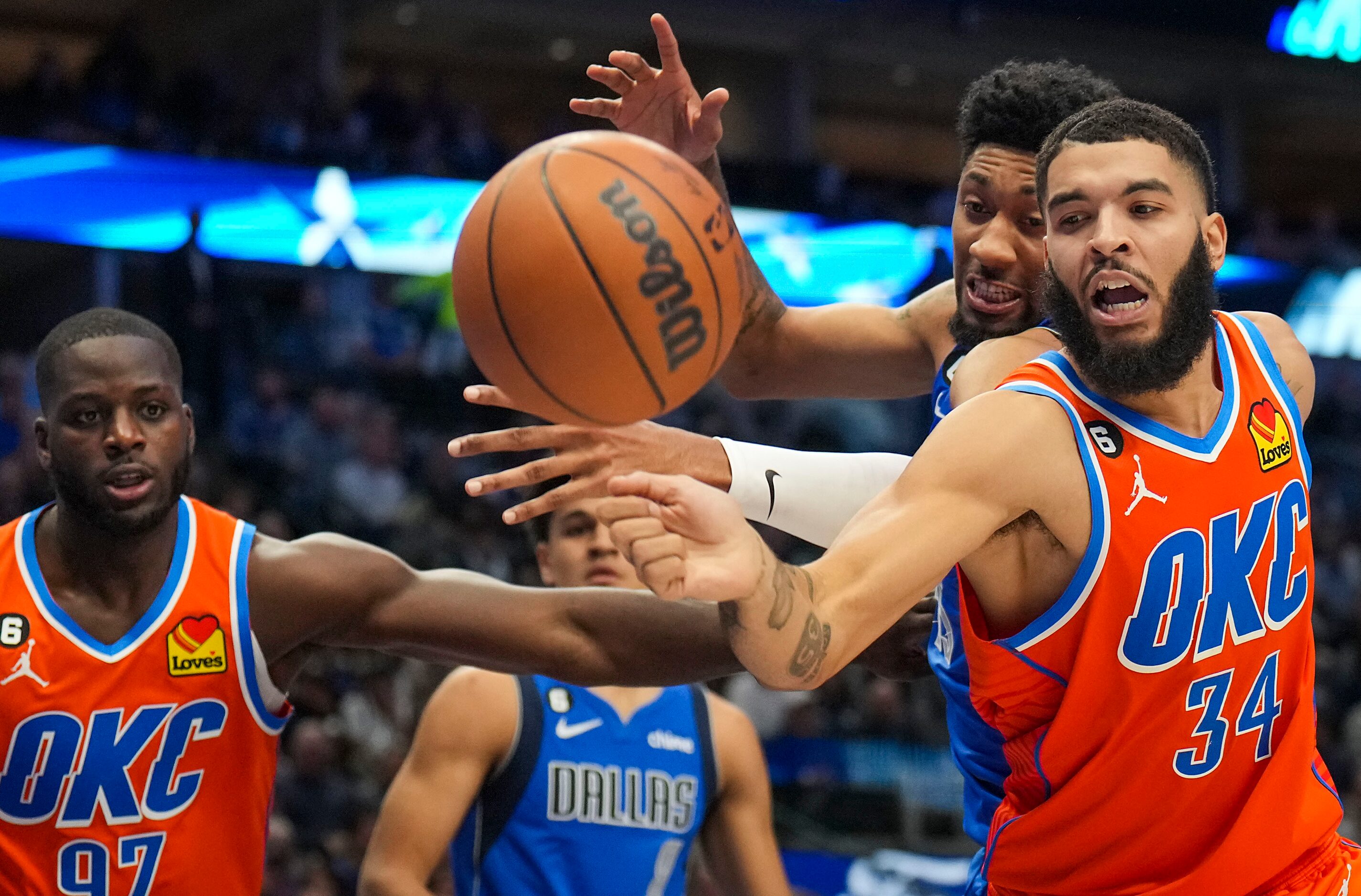 Oklahoma City Thunder forward Kenrich Williams (34) fights for a rebound against Dallas...