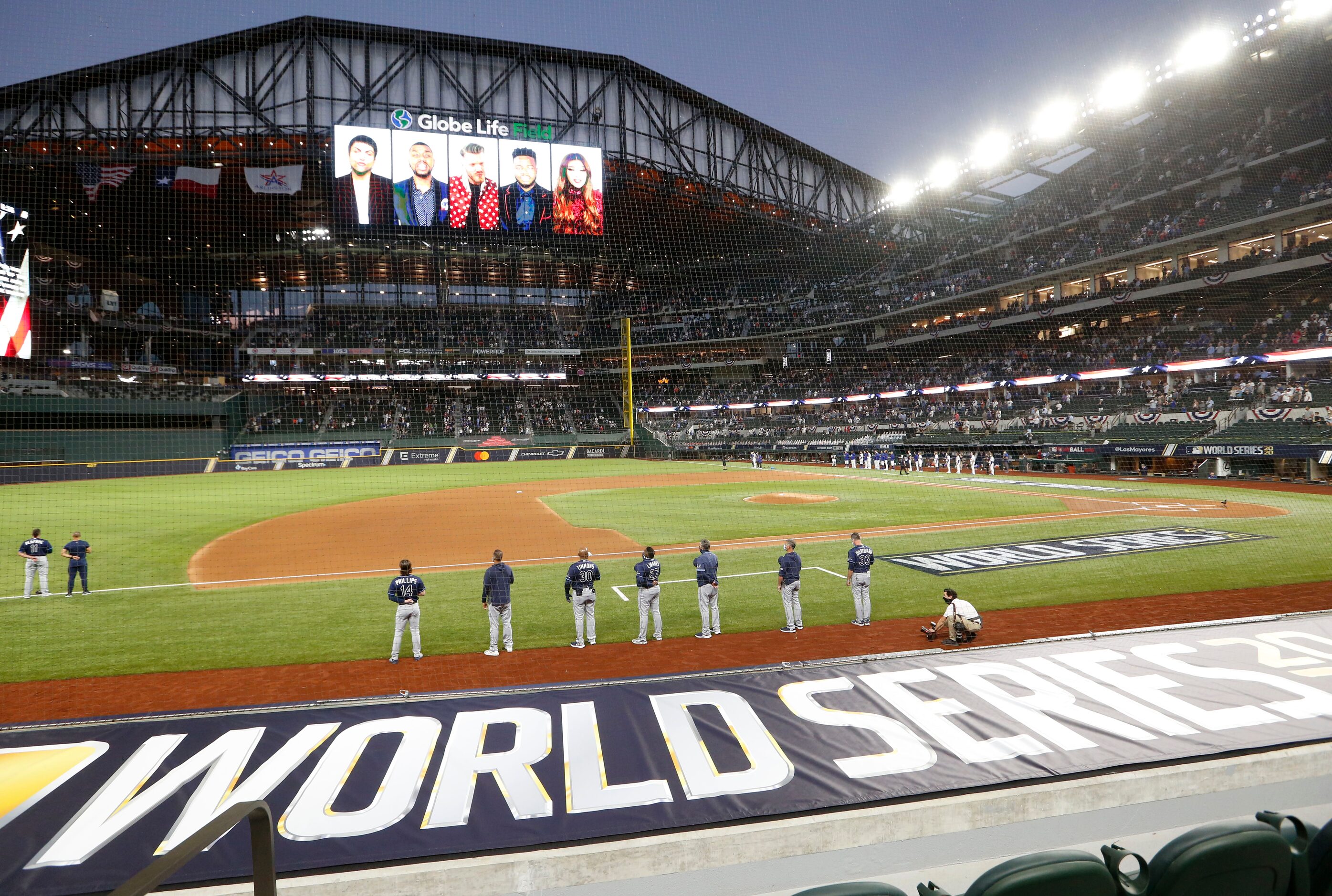 National anthem is sung virtually as the Los Angeles Dodgers and Tampa Bay Rays prepare to...