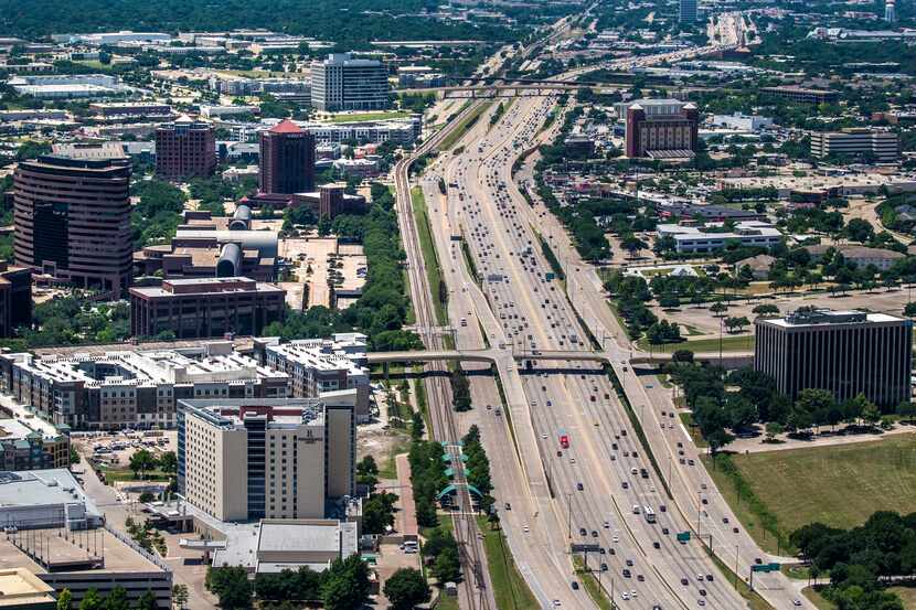 Vehicles travel on U.S. Highway 75 in Richardson, Texas, on Thursday, June 18, 2020.