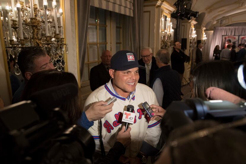 Newly elected baseball Hall of Fame inductee Ivan Rodriguez speaks to reporters during a...