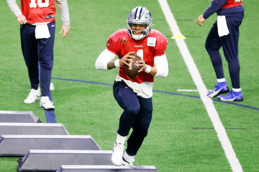 Dallas Cowboys quarterback Dak Prescott takes part in a drill during a team practice at The...