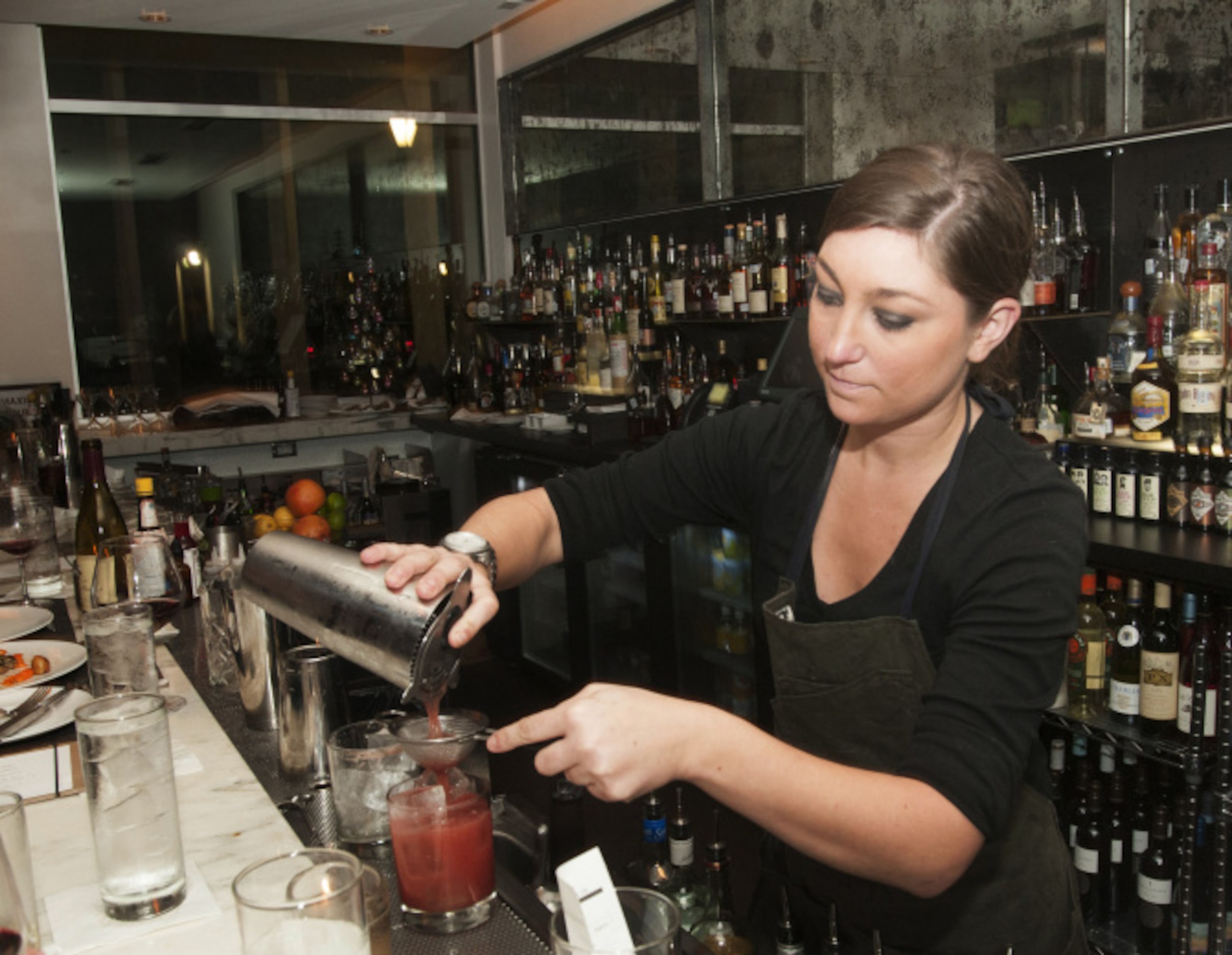 Head bartender Lauren Festa makes a Seasonal Smash.