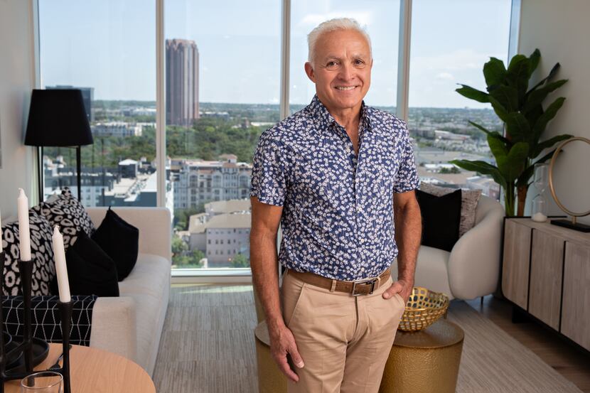 Al Coker, CEO of Al Coker & Associates, stands in one of the studio condos offered at One...