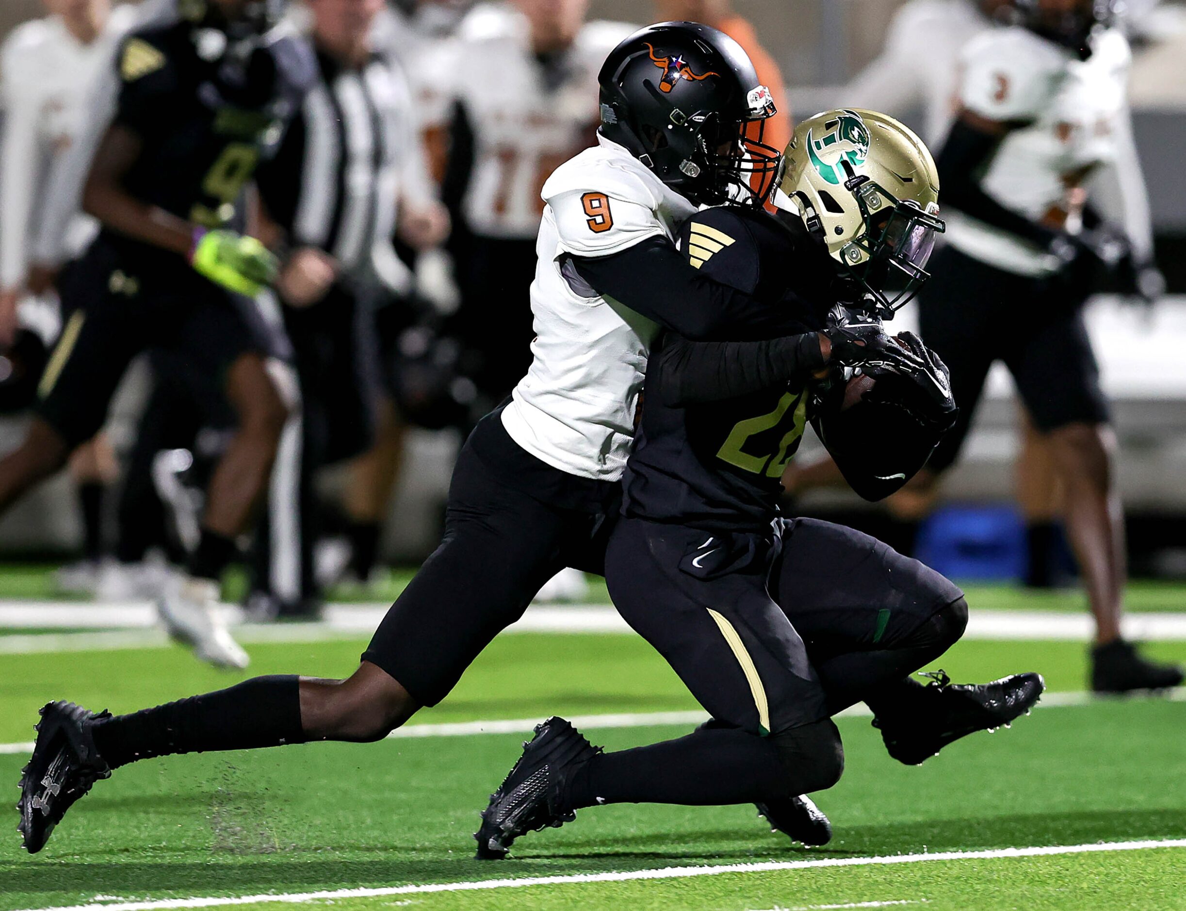 Birdville running back Jamal Ramsey (28) is finally brought down by W.T. White defensive...