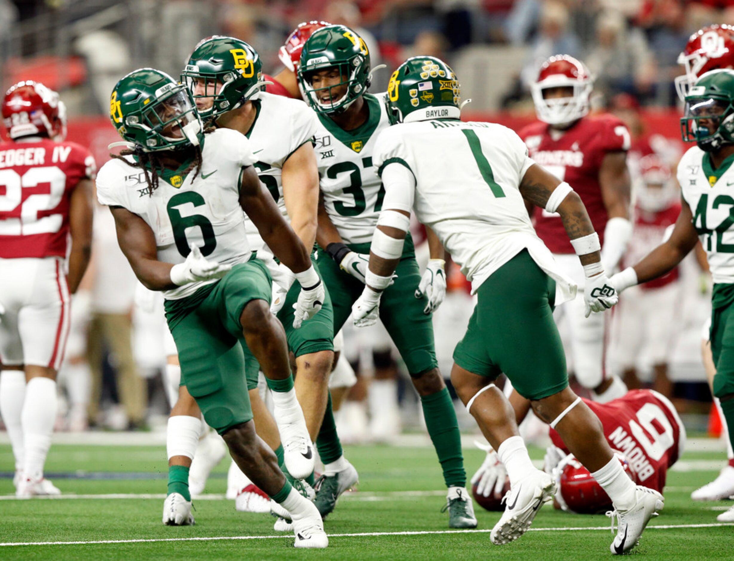 Baylor Bears running back JaMycal Hasty (6) celebrates the Bears stop of Oklahoma Sooners...