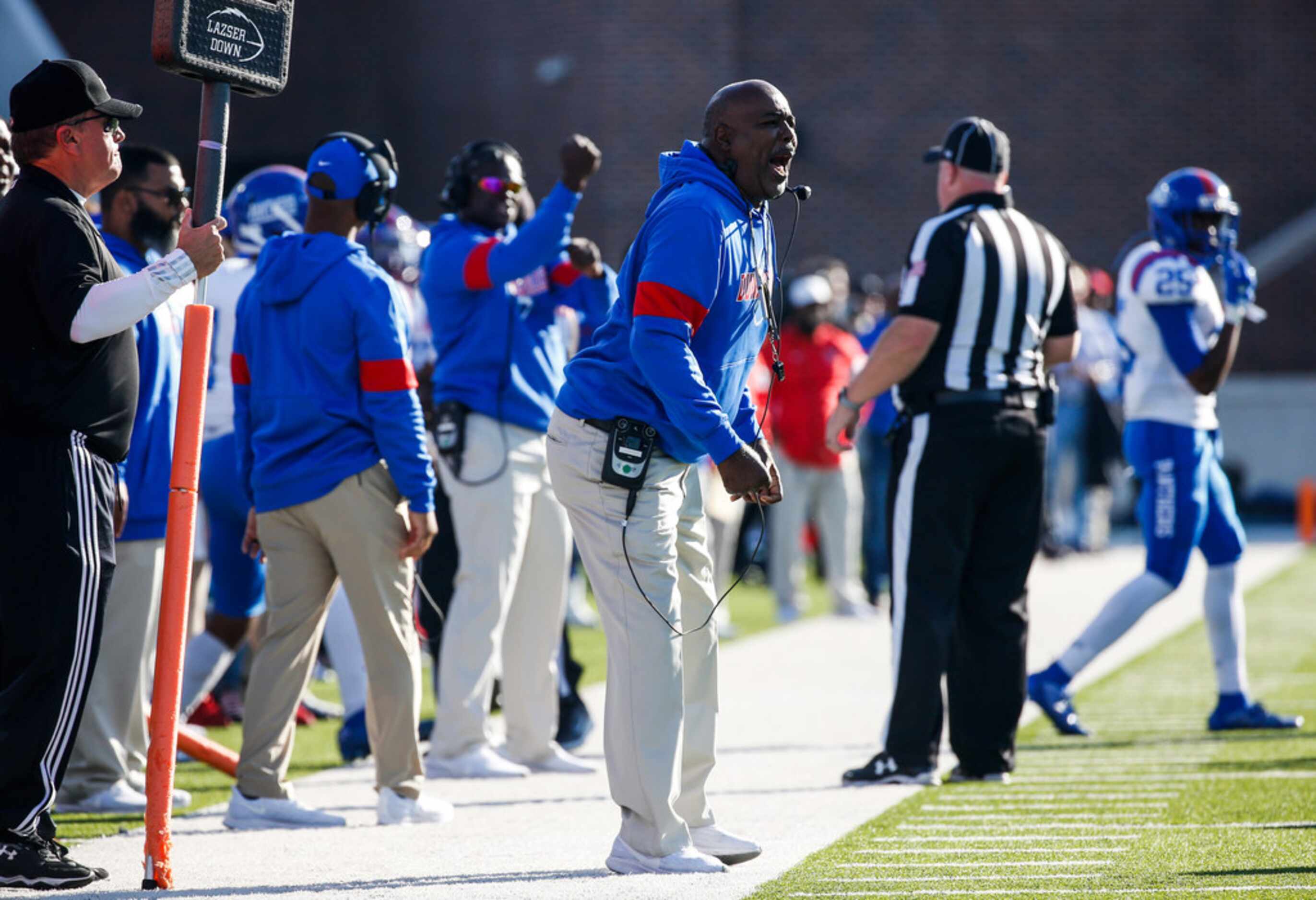 Duncanville head coach Reginald Samples works the sideline during the first half of a Class...