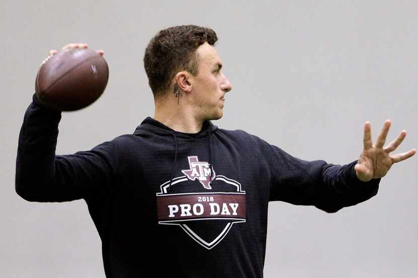 Former Cleveland Browns quarterback Johnny Manziel throws during drills at his alma mater...