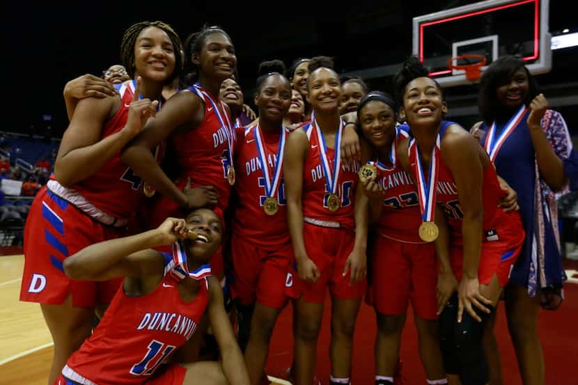 Duncanville celebrates a 76-65 win over Houston Cypress Ranch during the Class 6A girls...