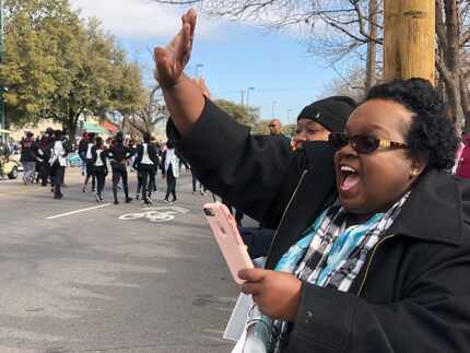 Anita Coleman cheers on her daughter Kimberlyn as she drives through in the parade....