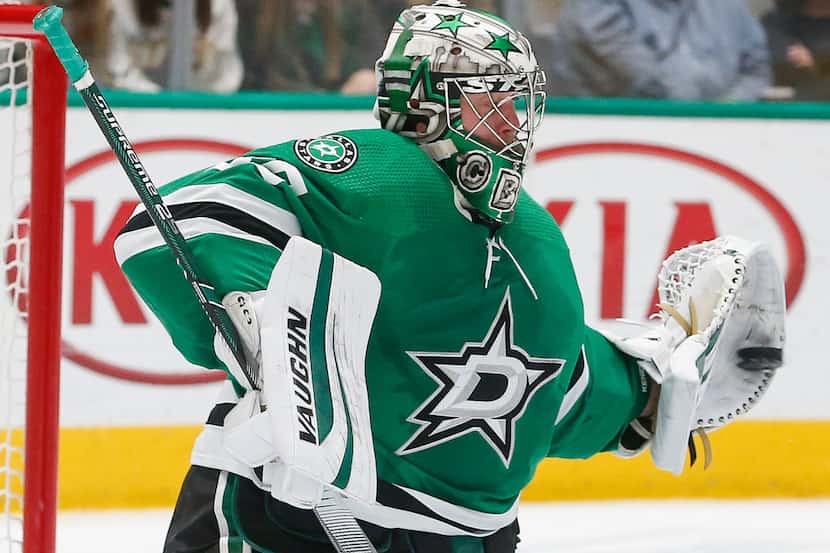 Dallas Stars goaltender Anton Khudobin (35) makes a save during the second period of an NHL...
