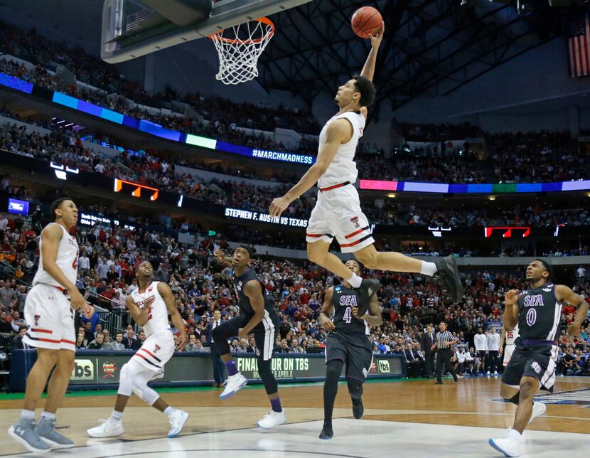 Texas Tech's Zach Smith (11) flies in for a dunk attempt in the second half against Stephen...