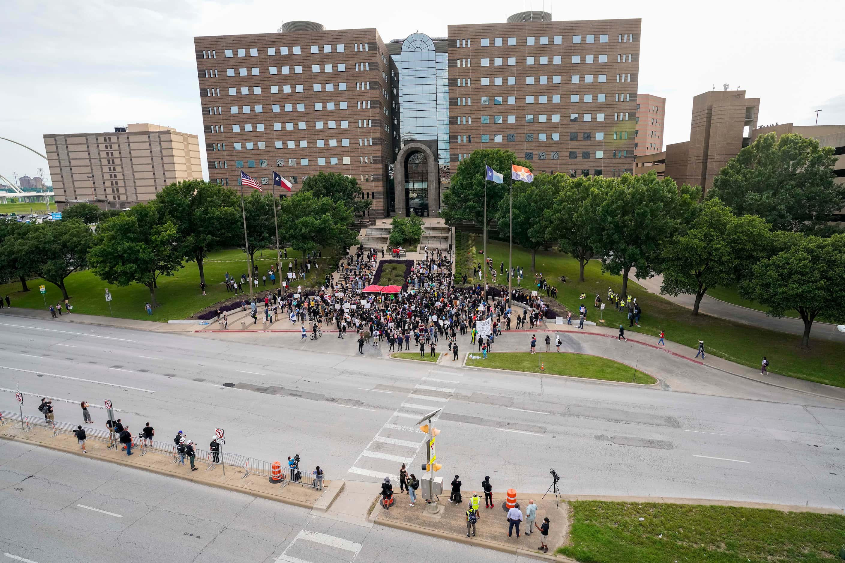 Demonstrators rally at the Frank Crowley Courts Building, on Riverfront Blvd., as protests...