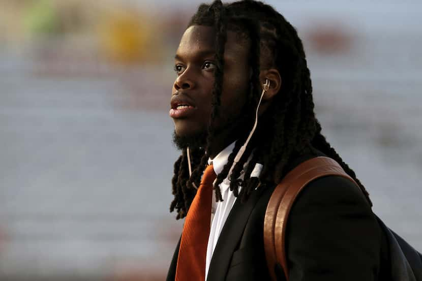 AUSTIN, TX - NOVEMBER 24:  Malik Jefferson #46 of the Texas Longhorns arrives at the stadium...