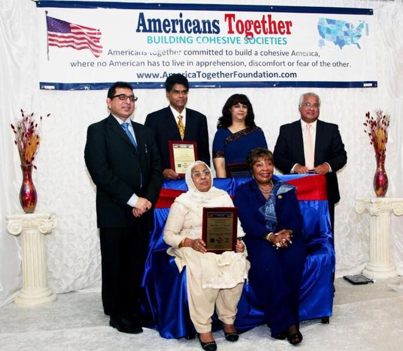 
The Interfaith Thanksgiving Celebration included (standing, from left): Raja Zahid A....