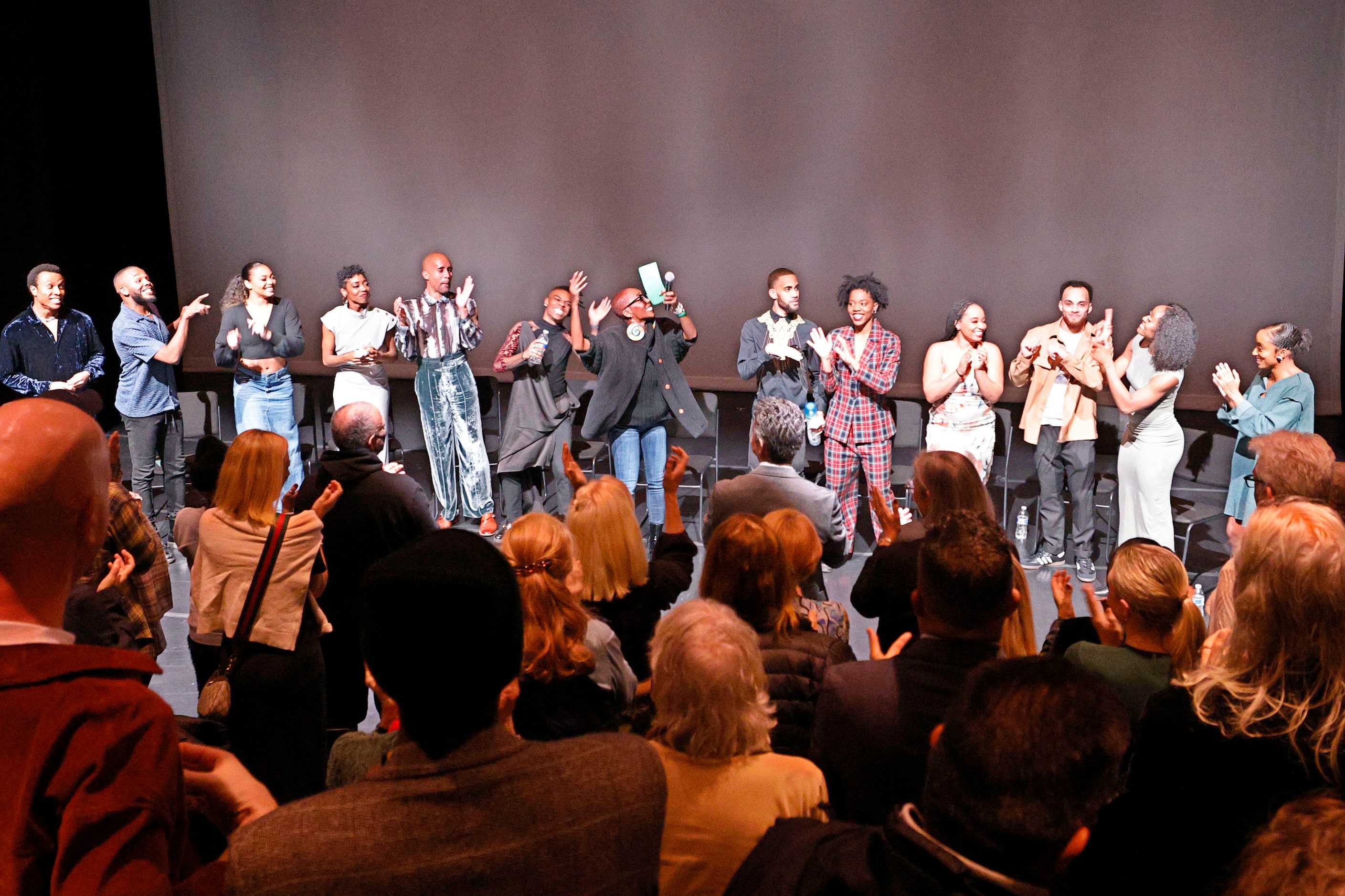 Former Dallas Black Dance Theatre dancers are introduced by Michelle N. Gibson, professor of...