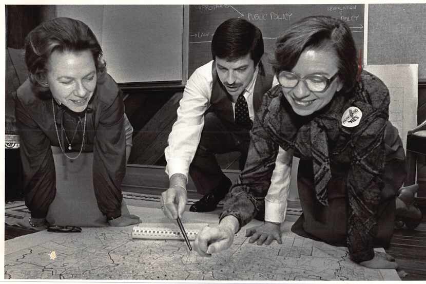 From left, WAG Team members Enid Gray, John Weekly and Judy Bonner Amps plan strategy, photo...